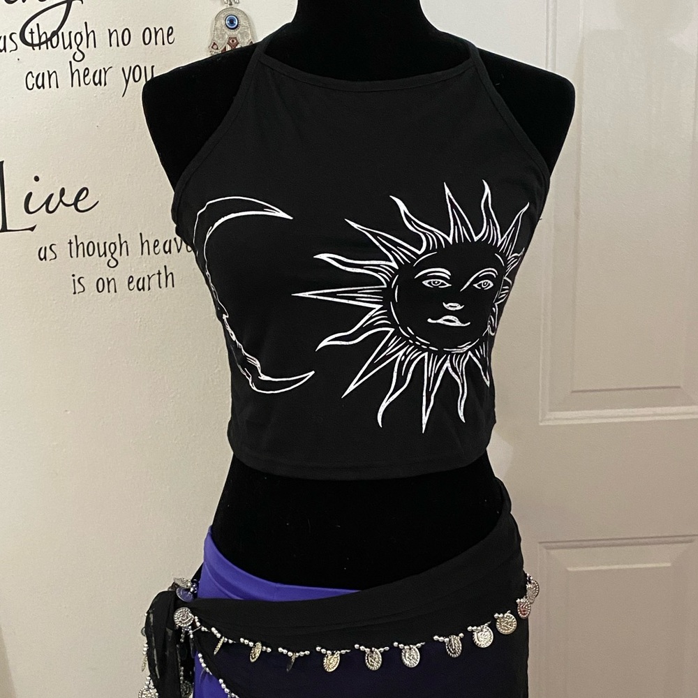 Sun and moon cropped black halter top.